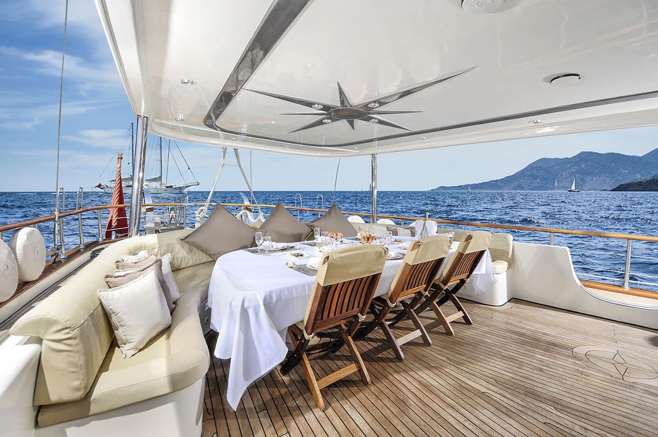 White tablecloth deck dining on a luxury yacht