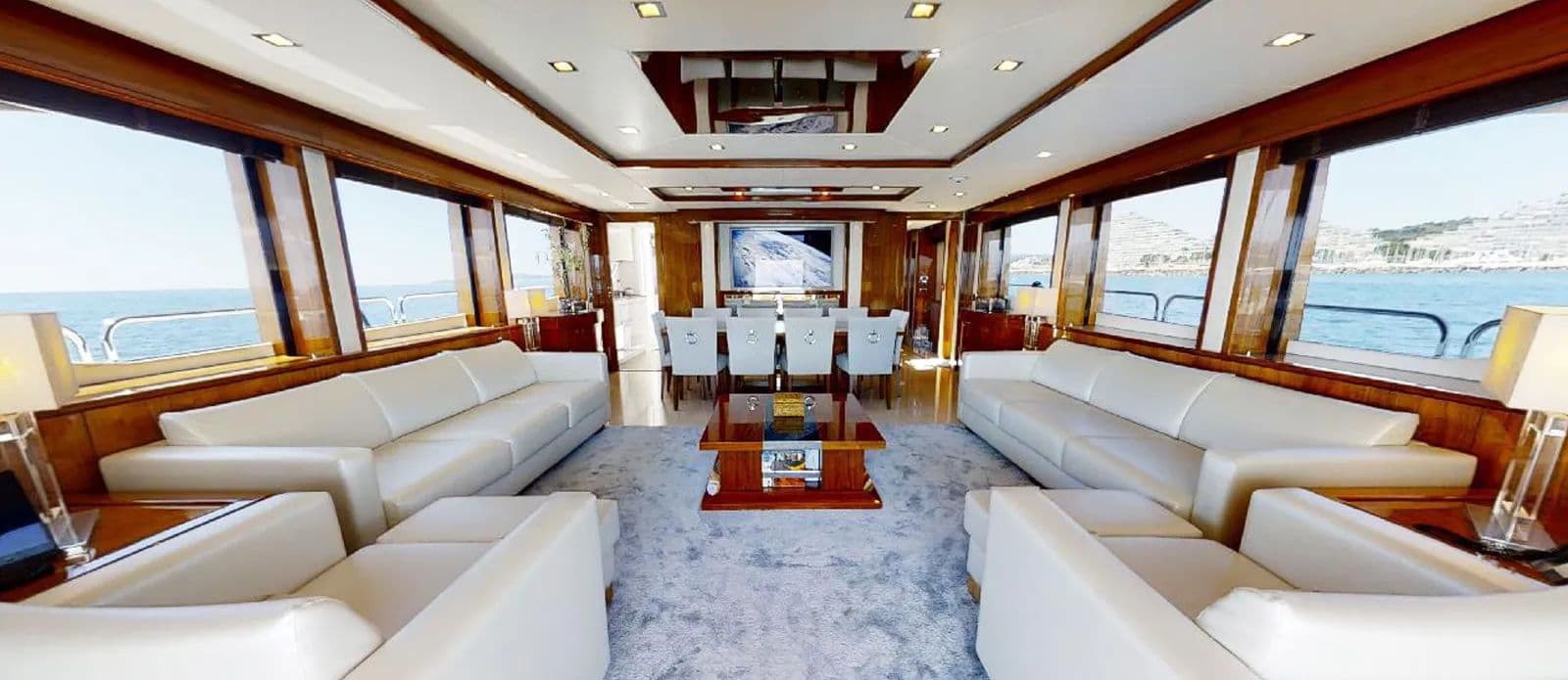 Luxury yacht interior salon with panoramic windows